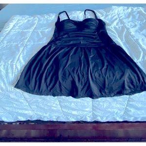 Swim suit, cover up, cinched waist, skirted, fun and flattering.